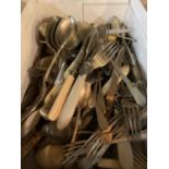 AN ASSORTMENT OF VARIOUS FLATWARE ITEMS