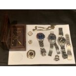 SIX FASHION WRISTWATCHES AND VARIOUS WATCH PARTS