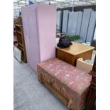 A PAINTED TWO DOOR WARDROBE AND UPHOLSTERED OTTOMAN