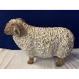 A LARGE RESIN RAM ORNAMENT