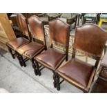 A SET OF FOUR EARLY 20TH CENTURY OAK DINING CHAIRS WITH LEATHER SEATS AND BACKS WITH STUDDED