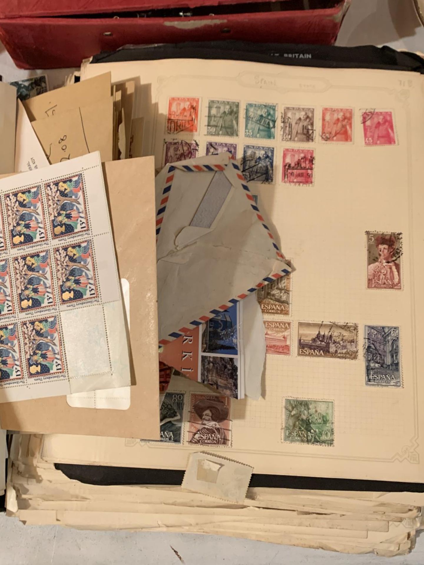 A FOLDER OF STAMPS, SOME SHEETS UNUSED AND MINT