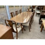 A MID 20TH CENTURY BURR WALNUT EXTENDING PEDESTAL DINING TABLE, 89x36" FULLY EXTENDED, AND EIGHT