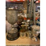 AN ASSORTMENT OF SILVER PLATED ITEMS INCLUDING A ROSE BOWL AND GOBLETS