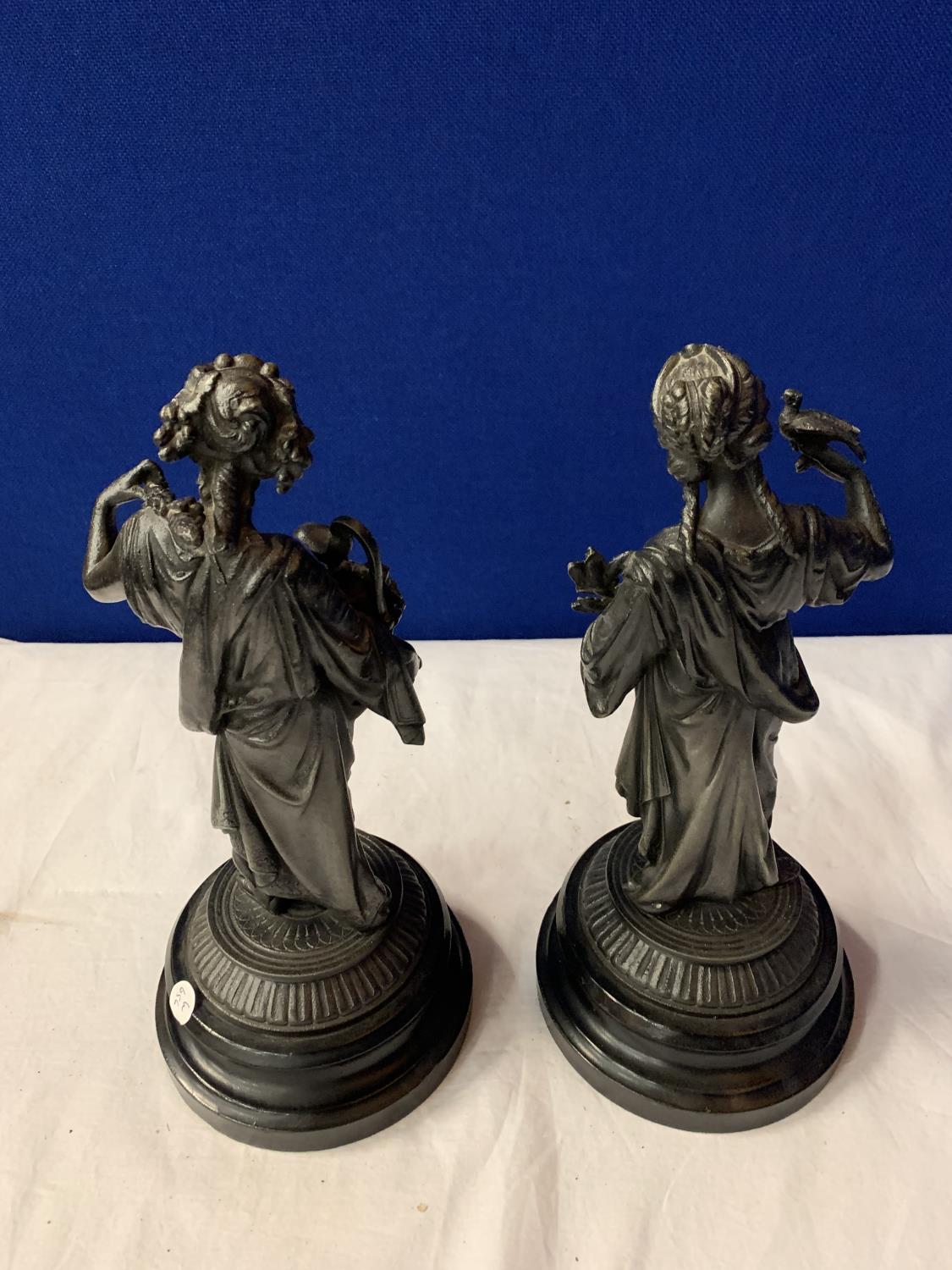 A PAIR OF SPELTER FIGURINES ON POLISHED WOODEN BASES - Image 4 of 5