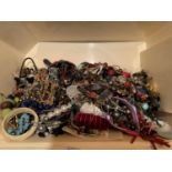 A BOX OF COSTUME JEWELLERY AND WATCHES
