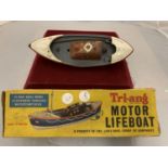 A 'TRI-ANG' SCALE MODEL OF A CLOCKWORK POWERED LIFEBOAT