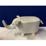 A FAUX SUEDE ELEPHANT FOOTSTOOL