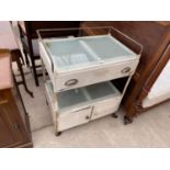 A MID 20TH CENTURY TWO TIER HOSPITAL/DENTISTS TROLLEY, WITH SINGLE DRAWER, HAVING SCOOP HANDLE,