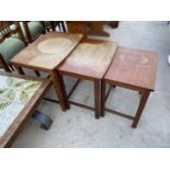 A NEST OF THREE TRETRO TEAK TABLES