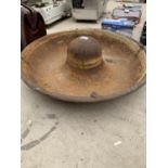 A VINTAGE CAST IRON 'MEXICAN HAT' ANIMAL DRINKING TROUGH