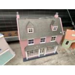 A DOLLS HOUSE WITH FURNITURE
