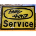 A 'LAND ROVER SERVICE' ILLUMINATED LIGHT BOX ADVERTISING SIGN