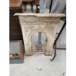 A CAST IRON BEDROOM FIRE SURROUND