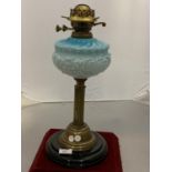 A VINTAGE OIL LAMP WITH BLUE BOWL