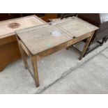 AN EARLY 20TH CENTURY DOUBLE CHILDS SCHOOL DESK