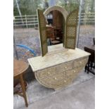 A MOROCCAN CRESCENT SHAPED DRESSING TABLE WITH SIX DRAWERS, DECORATED WITH CAMEL BONE AND BRASS