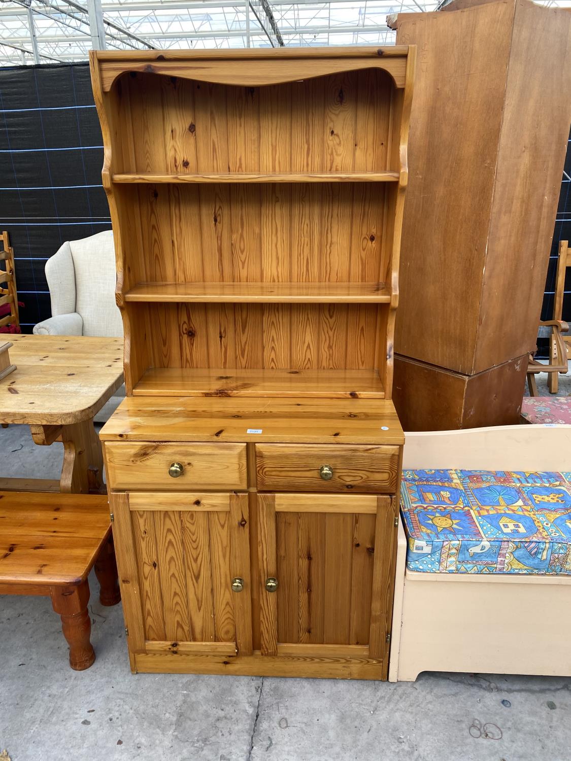 A MODERN PINE DRESSER COMPLETE WITH PLATE RACK, 31.5" WIDE