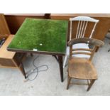 A FOLDING CARD TABLE AND TWO CHAIRS