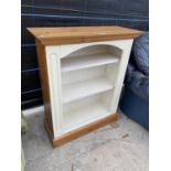 A PINE AND PAINTED THREE TIER BOOKCASE