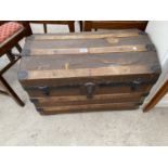 A VICTORIAN TWO HANDLED TRAVELLING TRUNK WITH DOMED TOP, 27" WIDE