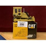 A NZG MODEL TRACKED CAT BULL DOZER