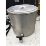 A LARGE METAL KETTLE PAN