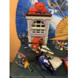 AN ASSORTMENT OF CAR RELATED TOYS TO INCLUDE GHOST BUSTERS CAR AND BUILDING