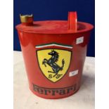 A RED METAL FERRARI PETROL CAN