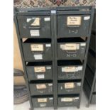 A VINTAGE INDUSTRIAL 10 DRAWER METAL STORAGE UNIT