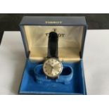 A VINTAGE BOXED TISSOT AUTOMATIC SEASTAR SEVEN IN WORKING ORDER (MINOR SCRATCHING TO FACE)