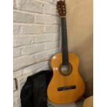 A HERALD ACCOUSTIC GUITAR WITH SOFT CASE