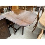 A MID 20TH CENTURY OAK GATELEG DINING TABLE ON BARLEYTWIST LEGS