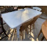 A PAINTED KITCHEN TABLE, 60x33" TOGETHER WITH THREE CHAIRS