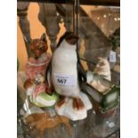 A TRIO CERAMIC ORNAMENTS TO INCLUDE A PENGUIN ETC