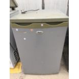 A SILVER WHIRLPOOL UNDER COUNTER FRIDGE BELIEVED IN WORKING ORDER BUT NO WARRANTY