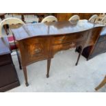 A REGENCY STYLE MAHOGANY INLAID AND CROSSBANDED BOWFRONTED SIDEBOARD ON SPADE FEET, 65" WIDE