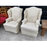 A PARKER KNOLL RECLINER WINGED CHAIR AND MATCHING EASY CHAIR (P.K. 1170/1/2/3/4)