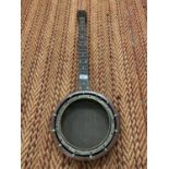 A BANJO WITHOUT STRINGS