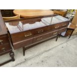 A 1960's MEREDEW SHINY WALNUT DRESSING TABLE BASE ENCLOSING TWO DRAWERS AND TWO CUPBOARDS, 60" WIDE