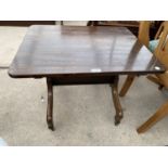 A MAHOGANY SIDE TABLE WITH GLASS TOP