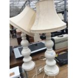 A PAIR OF DECORATIVE WHITE TABLE TOP LAMPS BELIEVED IN WORKING ORDER BUT NO WARRANTY