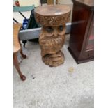A CARVED JARDINIERE STAND IN THE FORM OF AN OWL