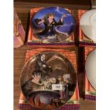 A PAIR OF HARERY POTTER ROYAL DOULTON DECORATIVE PLATES ' STRUGGLING THROUGH POTIONS CLASS' AND '