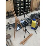 TWO WOODEN EASELS AND A MICROPHONE STAND