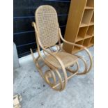 A MODERN BENTWOOD ROCKER WITH SPLIT CANE SEAT AND BACK