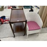 AN OAK TEA TROLLEY AND A LLOYD LOOM STYLE ARMCHAIR