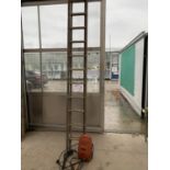 A POWER DEVIL PRESSURE WASHER AND A WOODEN EXTENDING LADDER WITH METAL RUNGS