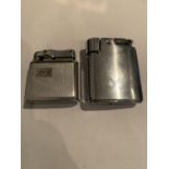 TWO WHITE METAL LIGHTERS