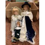 THREE ASSORTED PORCELAIN HEADED DOLLS